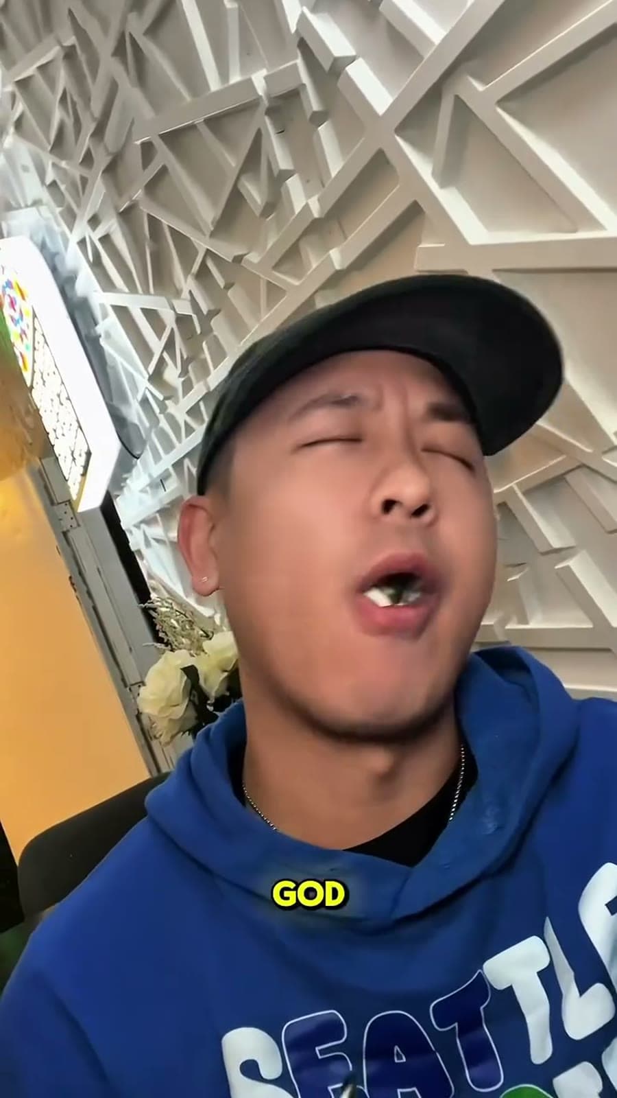 Steven tasting food at One Million Cafe